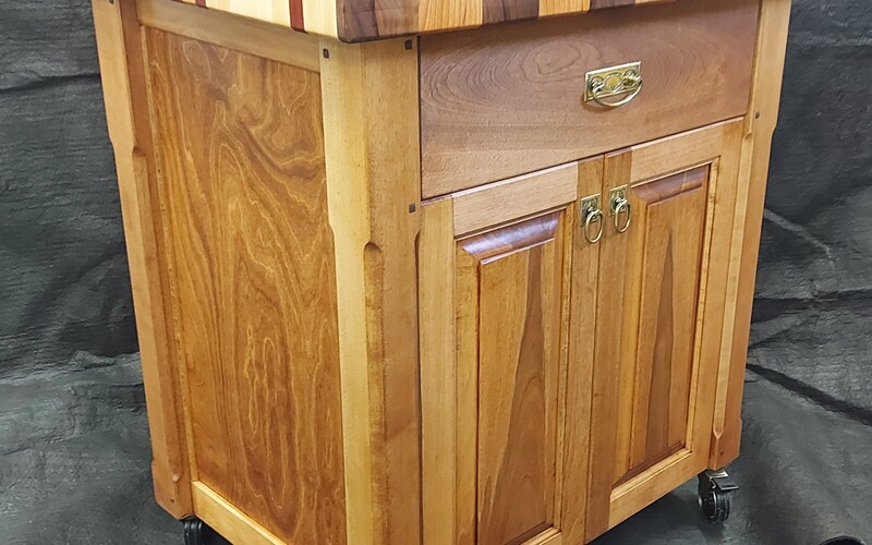 Island on wheels with cabinet.  Any size.   On order only.